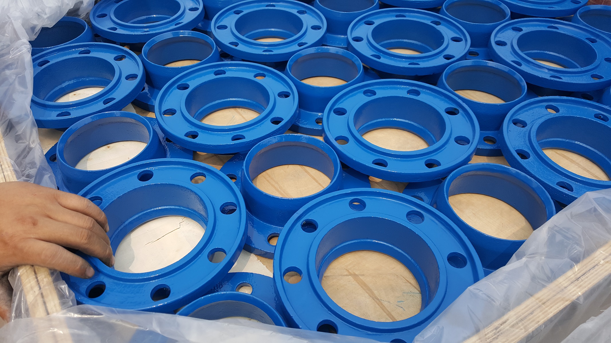 Blue coated ductile iron flanges batch