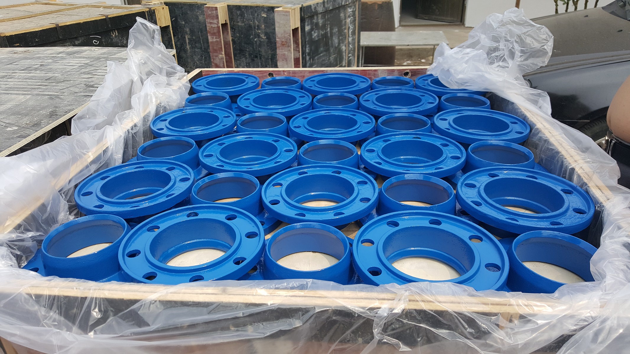 Blue coated flange components in export packing