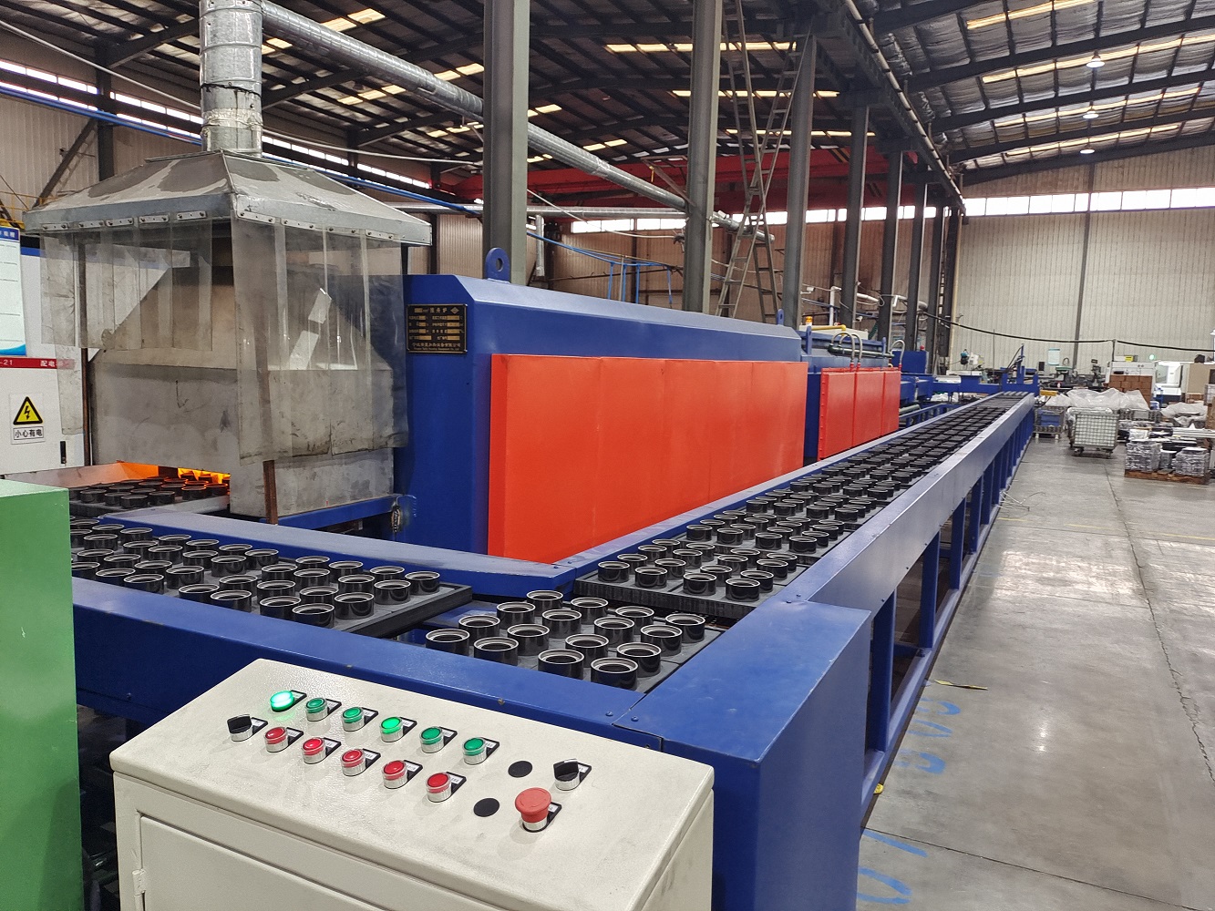Continuous industrial heat treatment production line