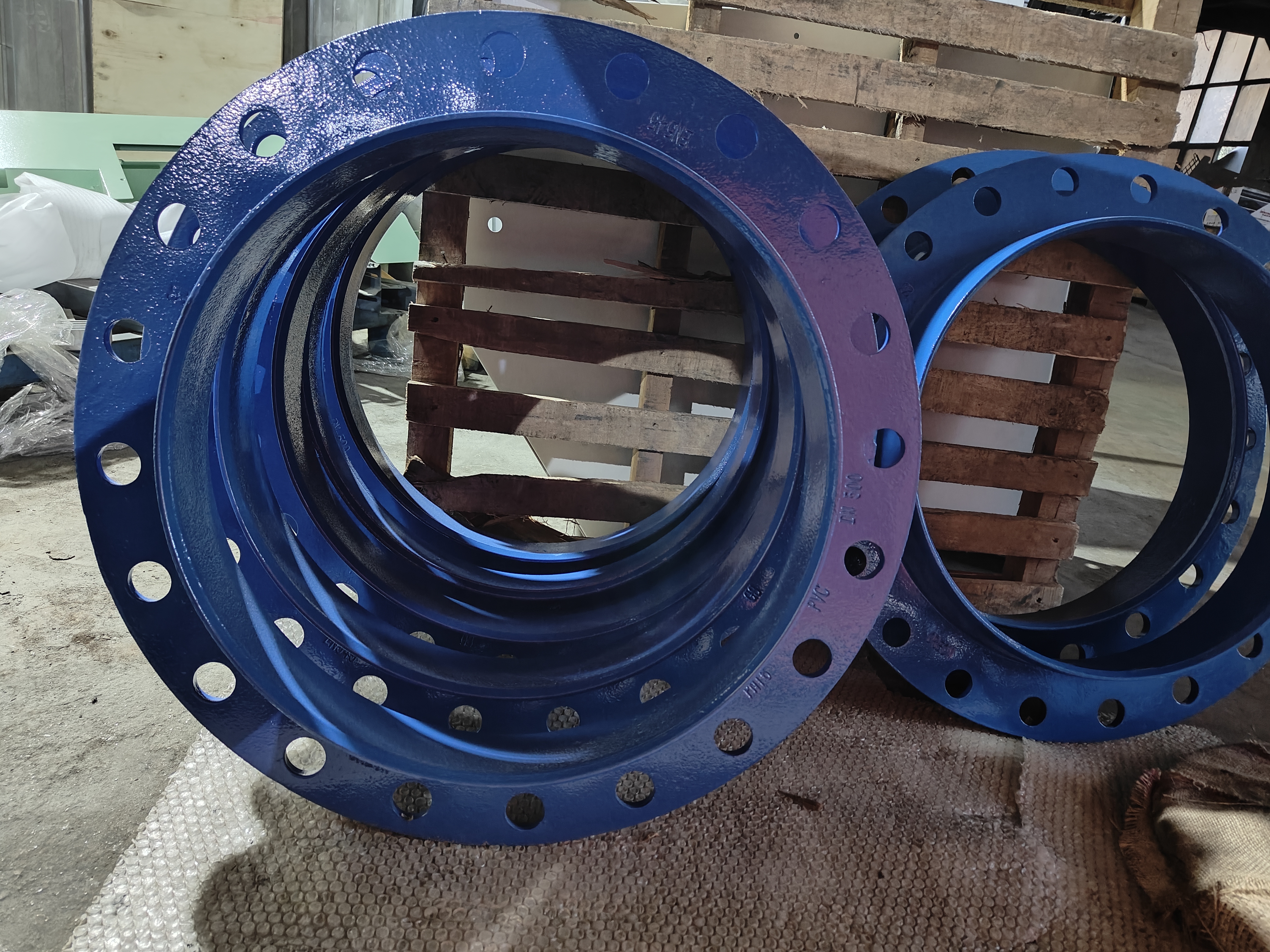 Blue coated ductile iron pipe fittings for water utilities and infrastructure supply