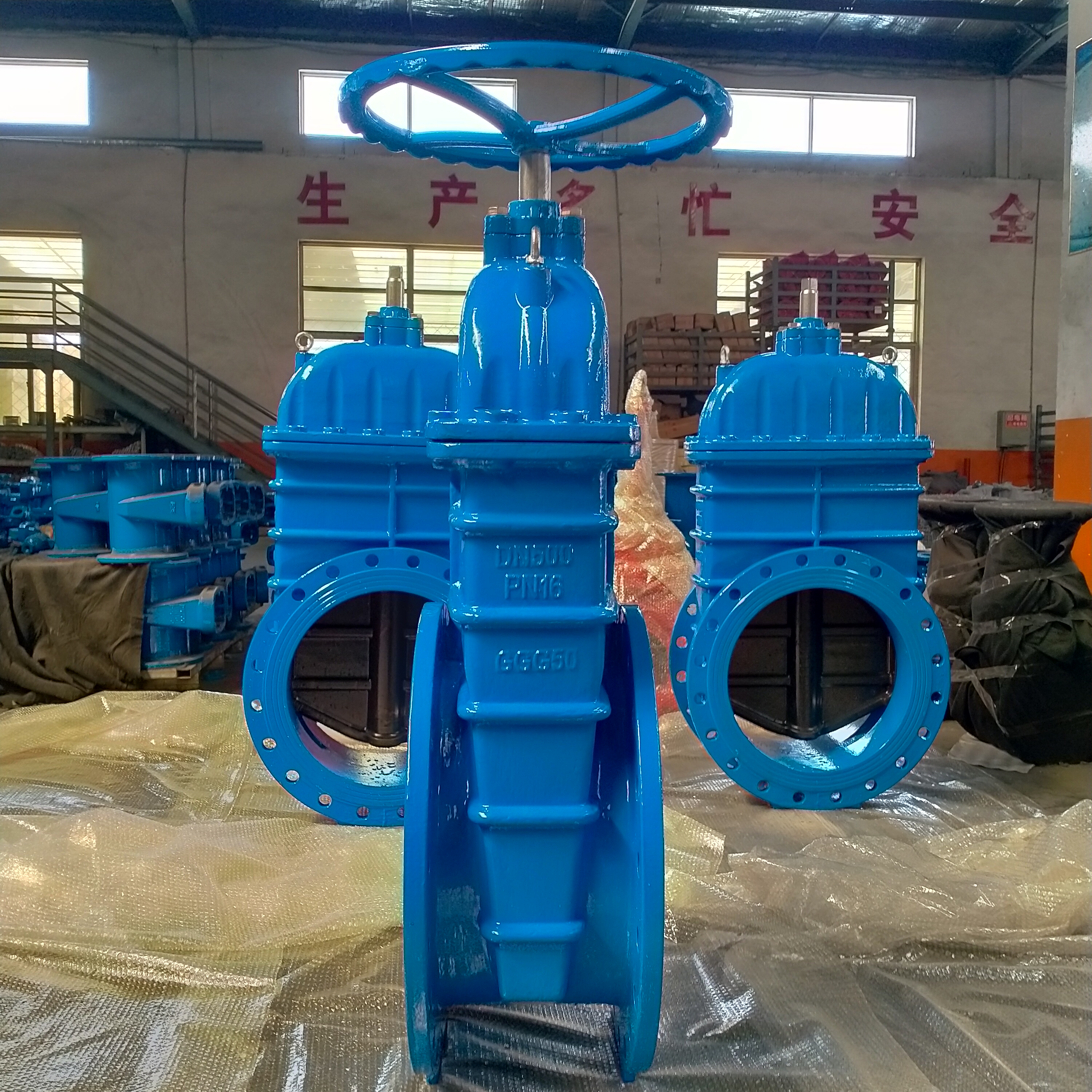 Large blue utility gate valves in factory