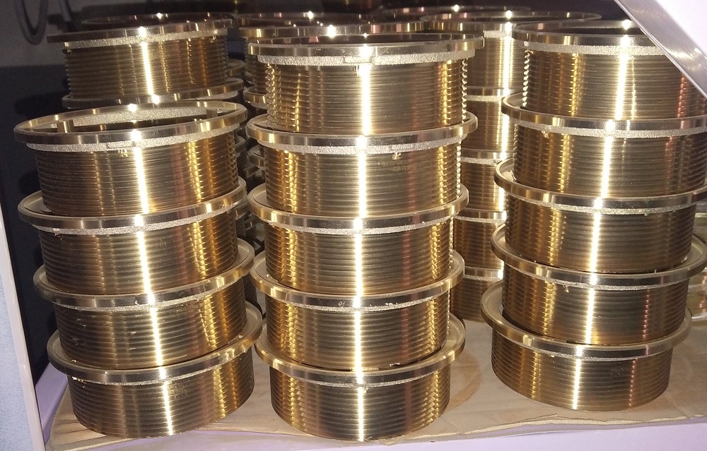 Precision machined bronze threaded components